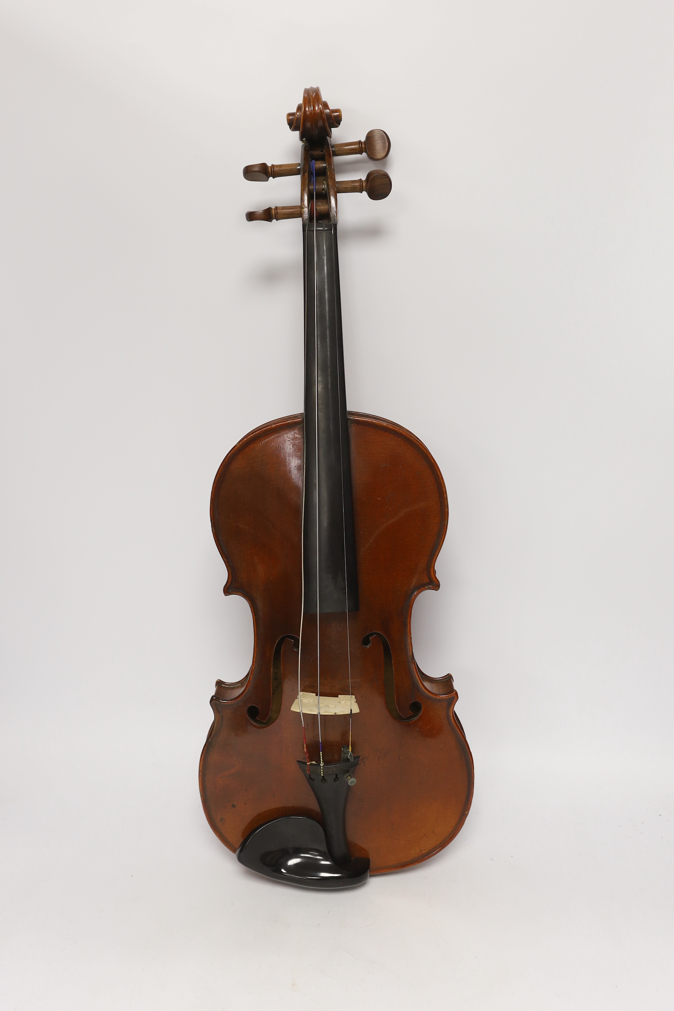 A French violin with a label for J. Nicolas Aine, a la Ville de Cremonne in an ebonised wooden case with outer canvas cover, body 36cm (without bow)